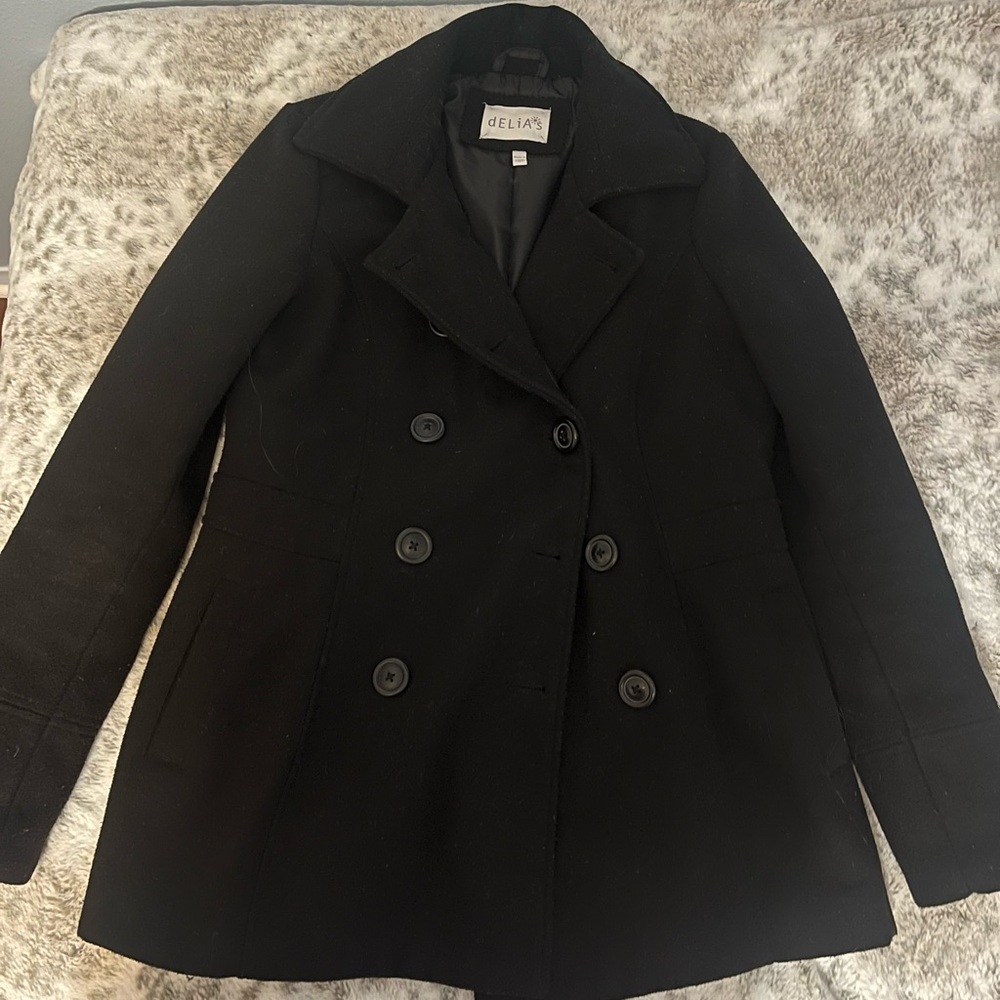 Delia’s black peacoat